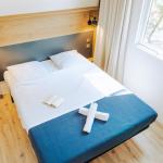 Slide Master double bedroom in the six-person cottages at Tropicana Campsite in Saint-Jean-de-Monts, Vendée