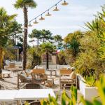 Slide Leisure area arranged around the pool with Mediterranean-style décor at Tropicana Campsite in Saint-Jean-de-Monts, Vendée