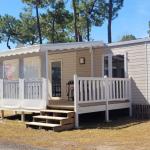 Slide Premium 4-person cottage – exterior view at Les Places Dorées***** campsite