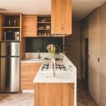 Slide Modern, fully equipped kitchen open to the living room in the Premium 6-person cottage at Les Places Dorées***** campsite