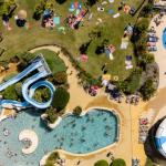 Slide Aerial view of the 1,500 m² water park at Les Places Dorées***** campsite