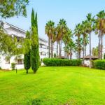 Slide Large landscaped green outdoor areas at the Sognu Di Rena residence in Moriani-Plage