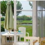 Slide View from the living room of the Fontenelles houses in Vendée overlooking a garden and the golf course