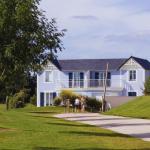 Slide A blue Fontenelles house set in a green environment