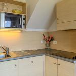 Slide Cuisine équipée et fonctionnelle au sein d’une maison en Bretagne