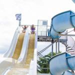 Slide Triple-lane water slides within the water park at Résidence Antinéa
