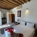 Slide Double bedroom with private shower room and traditional décor at Villa Dar Wellness