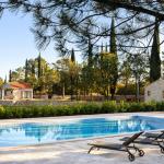 Slide Rental of the Sveta Ana Lodges cottages in Croatia, set on a 2-hectare estate with a shared swimming pool