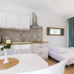 Slide Fold-out sofa bed in the living room of the Sveta Ana Lodges cottages in Croatia