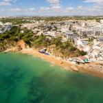 Slide Aerial view of the Do Parque residence located in the seaside resort of Olhos d’Água