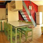 Slide Dining area in a cottage at Résidence Vorey-sur-Arzon with open-plan kitchen