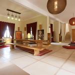 Slide Espace à vivre avec coin salon et salle à manger de la villa Dar Dream au Maroc