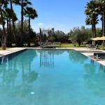 Slide Swimming pool with hot tub at Villa Dar Dream in Morocco