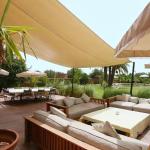 Slide Outdoor lounge with sofa and table area at Villa Dar Dream in Morocco