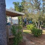 Slide Mobilhomes avec terrasse au camping Lacasa à Calcatoggio en Corse