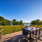 Slide Furnished villa terrace by the lake at Golden Lakes Village Estate