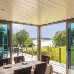 Slide Large, spacious villas with open views to the outdoors facing the lake at Golden Lakes Village Estate