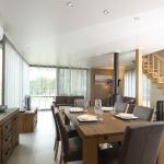 Slide Spacious living room for the whole family with dining area and upper floor at Golden Lakes Village Estate