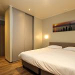 Slide Master bedroom with a double bed at Golden Lakes Village Estate