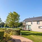 Slide Spacious villa rentals with private garden plots by the lake at Golden Lakes Village Estate in Belgium
