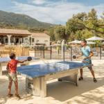 Slide Play area with table tennis at Camping Lacasa in Calcatoggio, Corsica