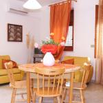 Slide Living room in accommodation at the Baia d’Oro residence in Sicily