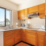Slide Fully equipped and functional kitchen in the standard accommodations at Balaia Golf Village