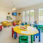 Slide Indoor games for children at the mini club at Balaia Golf Village