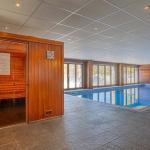 Slide Espace bien-être intérieur avec piscine chauffée et sauna à la résidence Les Terrasses de Veret à Flaine