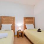 Slide Twin bedroom with two single beds at Le Parc des Airelles residence
