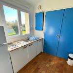 Slide Fully equipped blue kitchen at Le Domaine du Lambon