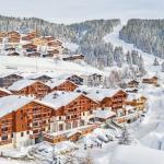 Slide Les Chalets d’Emeraude aux Saisies sous la neige