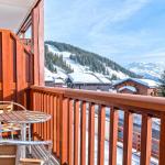 Slide Balcon de la résidence Les Chalets d’Emeraude aux Saisies sous la neige