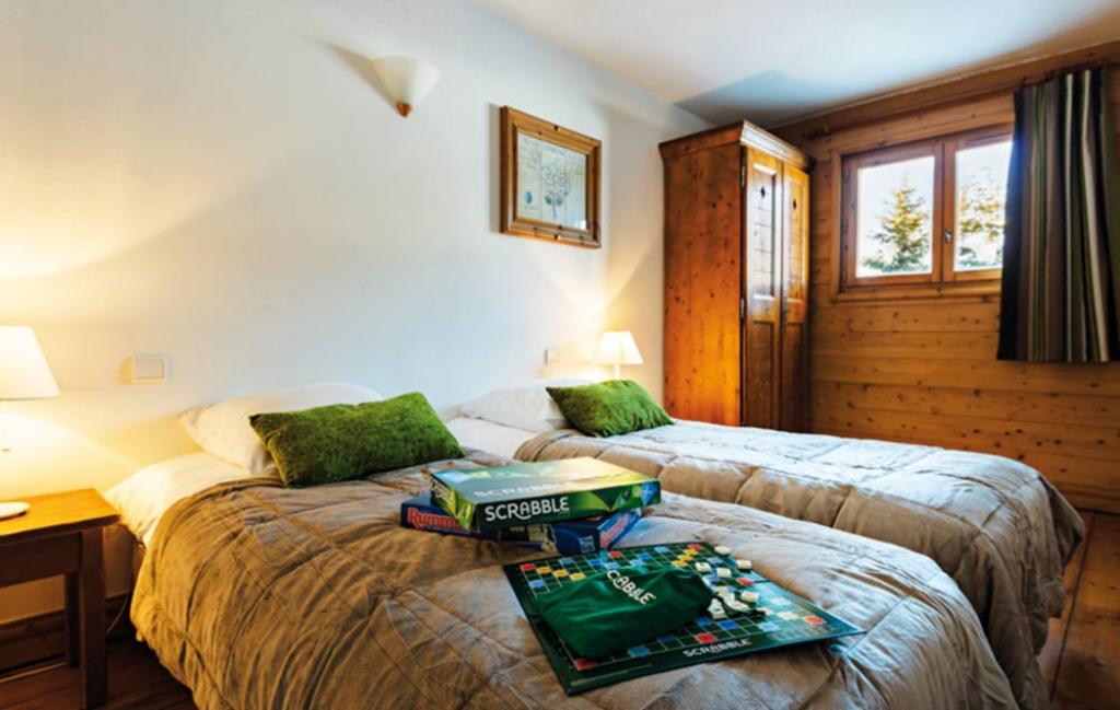 Slide un exemple de chambre avec 2 lits simples