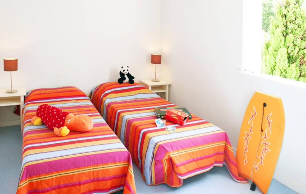 Slide un exemple de chambre avec 2 lits simples