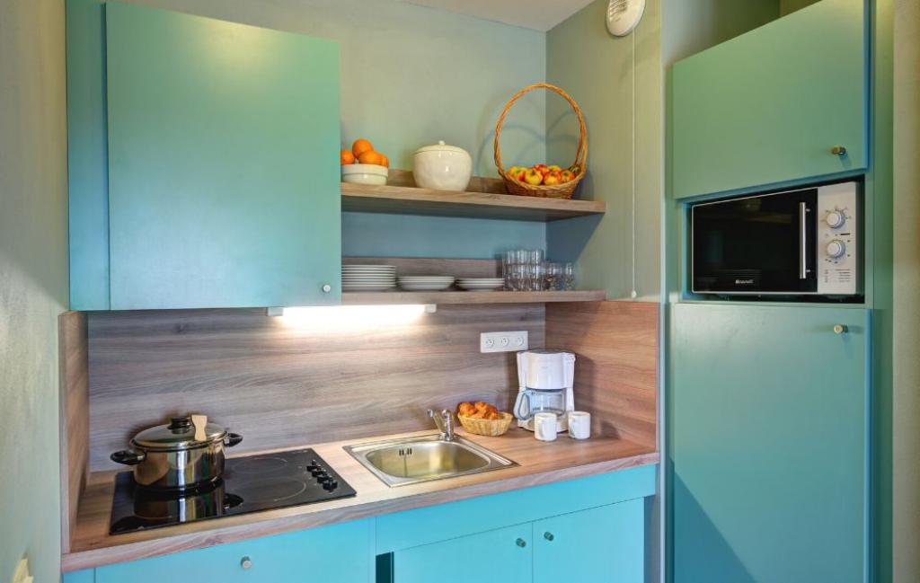 Slide Kitchenette dans appartement BO Cottage