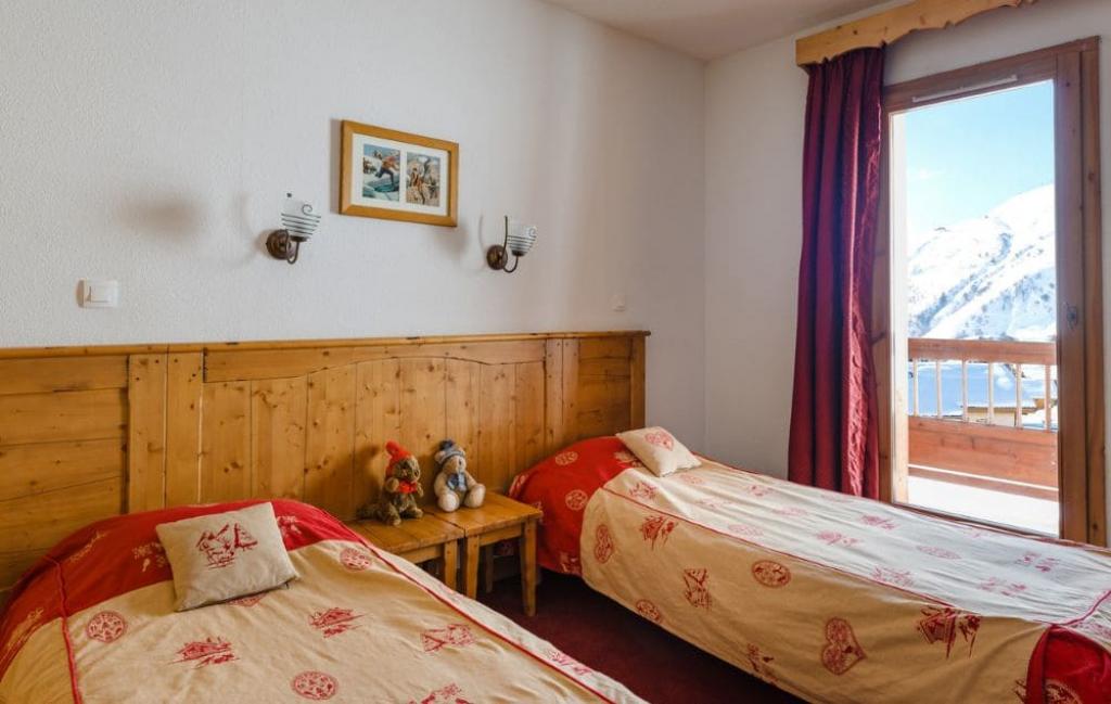 Slide Chambre lits simples d'un des logements