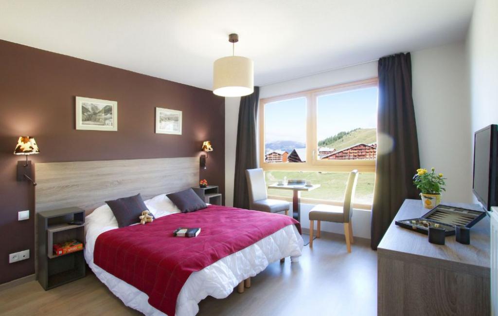 Slide Chambre lit double d'un des logements