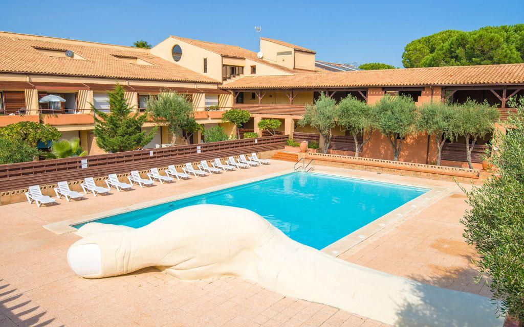 Slide Residence du Golf swimming pool at St Cyprien Plage