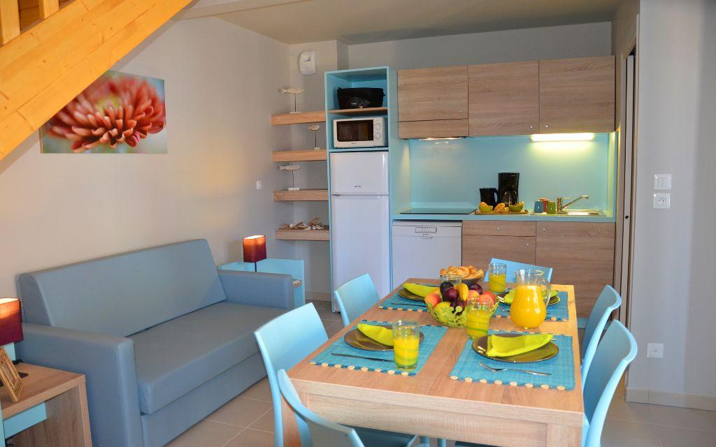 Slide Living room of  La Grenadine cottages in Marseillan