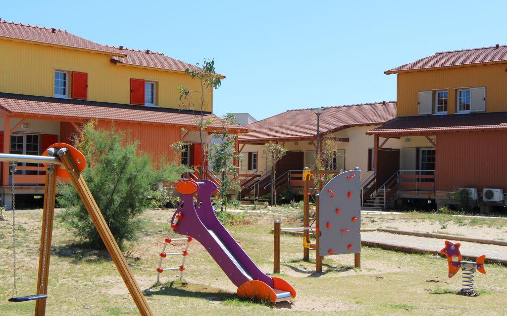 Slide Play area of  La Grenadine cottages in Marseillan