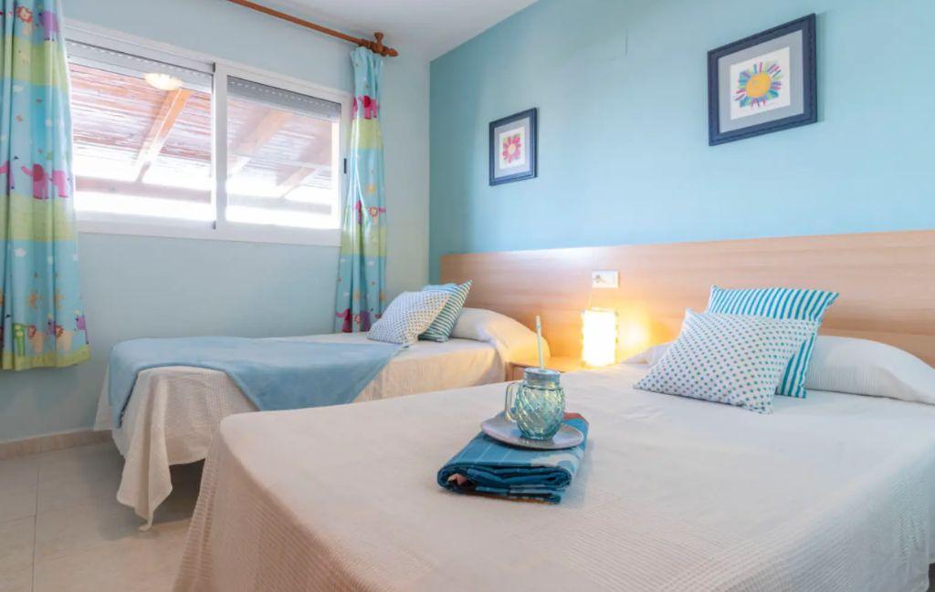 Slide Maison Lorena - chambre lits simples
