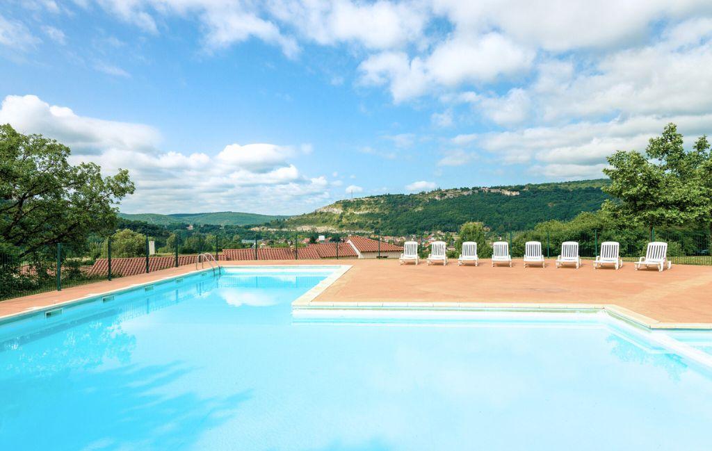 Slide Piscine de la résidence du Domaine des Cazelles by Ateya à Cajarc