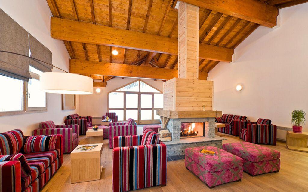 Slide Reception of La Cobe d'Or residence in Les Orres 1800 with fireplace