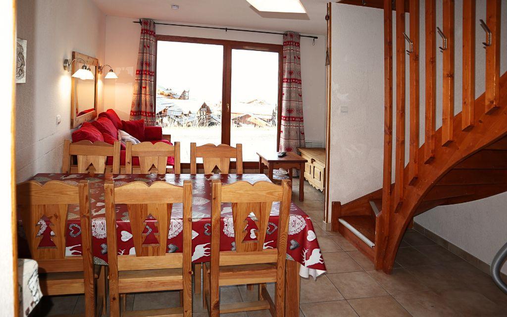 Slide Dining room in a duplex apartment in the mountains at the La Combe d'Or residence in Les Orres 1800