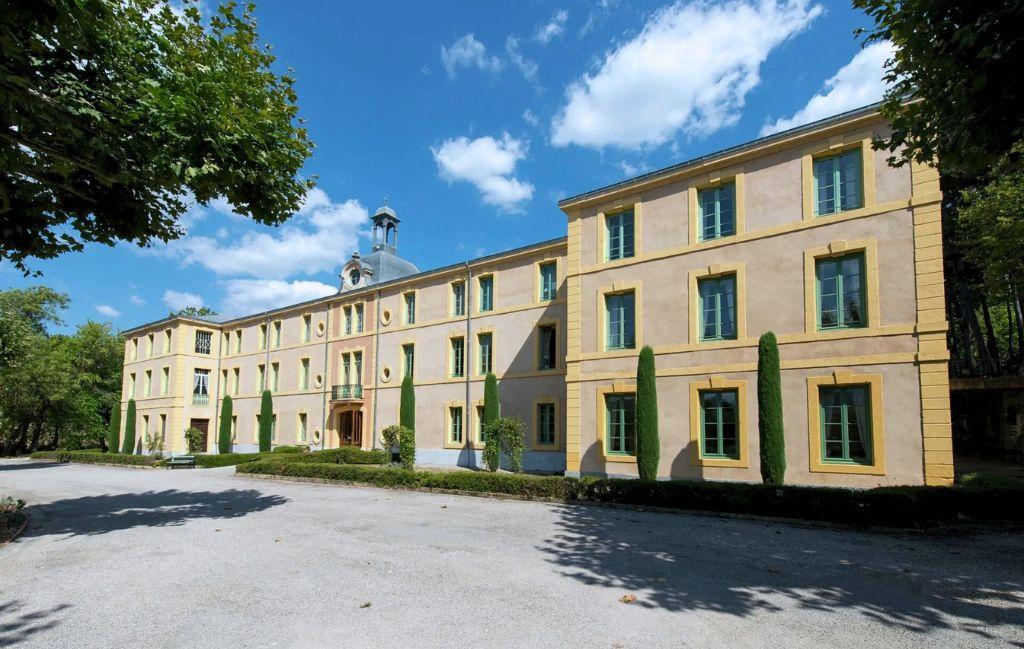 Slide Facade of the Château des Gipières, tourist residence in Montbrun-les-Bains
