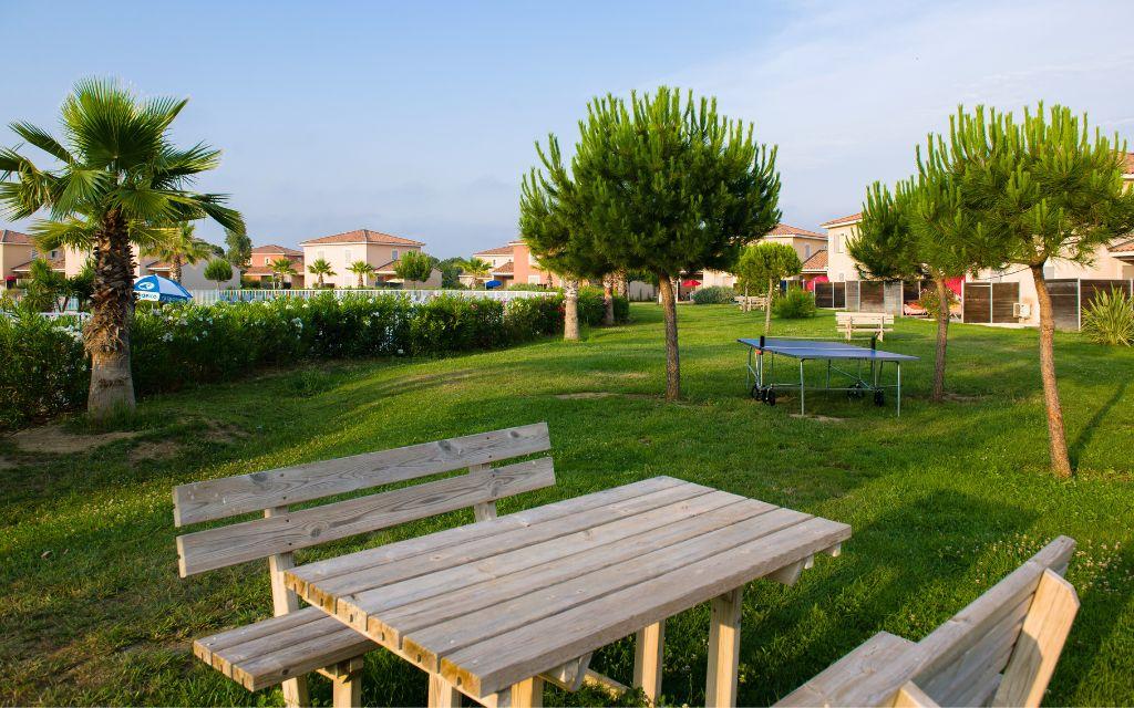 Slide Pétanque court and holidaymakers playing at Domaine du Golf residence in Fabrègues