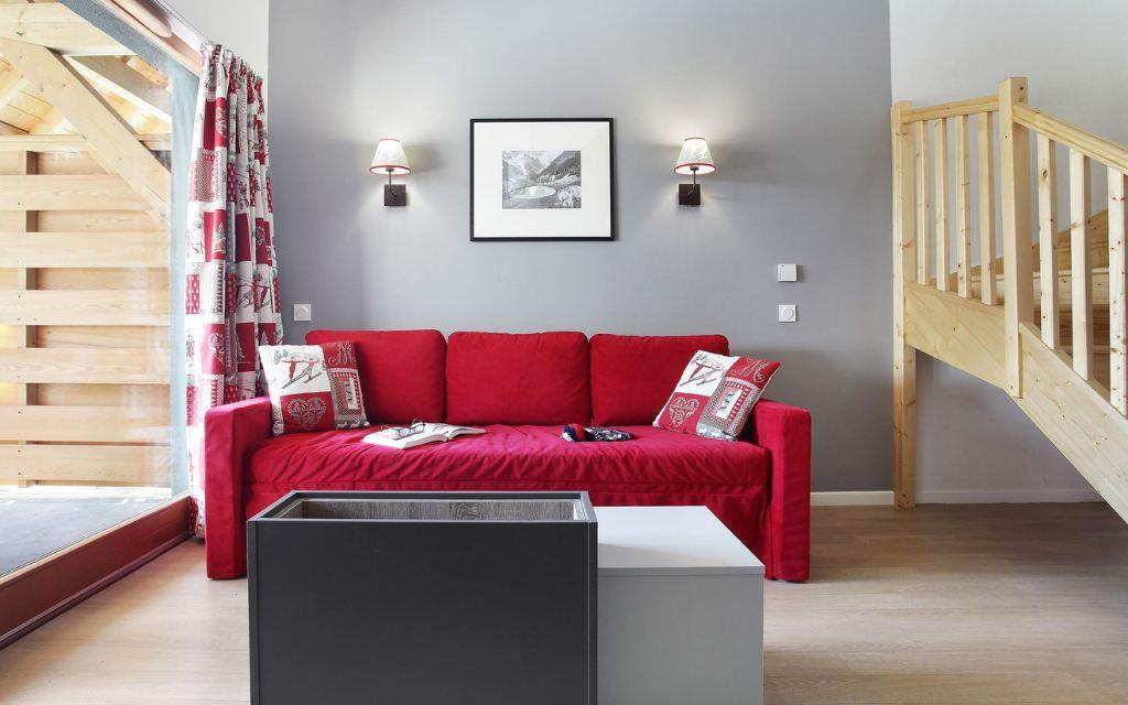 Slide Salon avec canapé dans un appartement de la résidence Aquisana