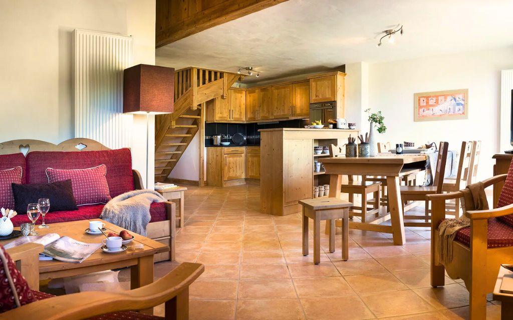 Slide Living area with open kitchen at the Le Village de Lessy residence