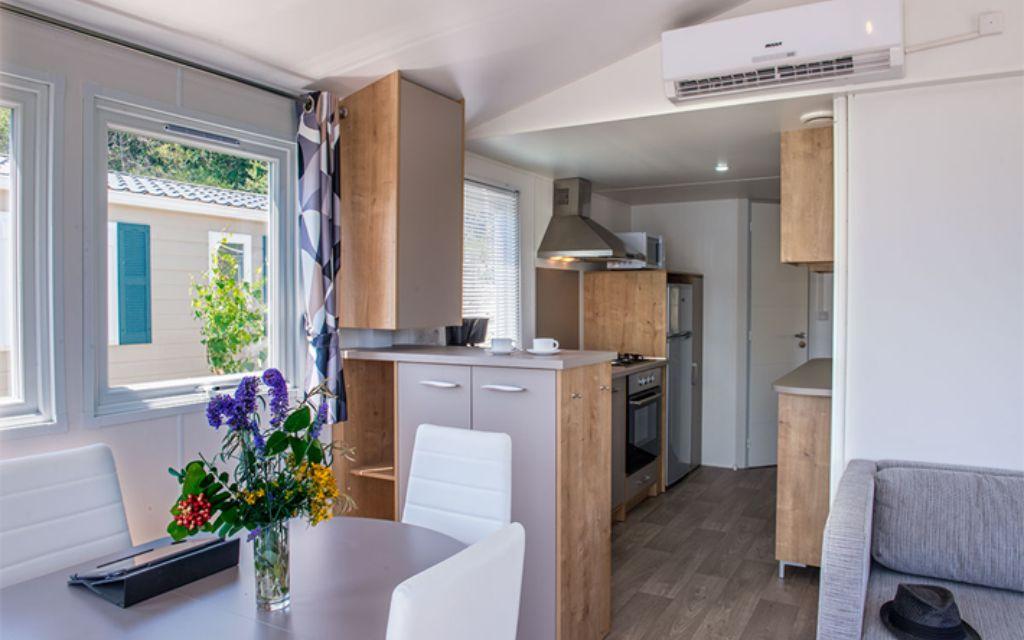 Slide Equipped kitchen at L’Écrin du Lac in Chorges